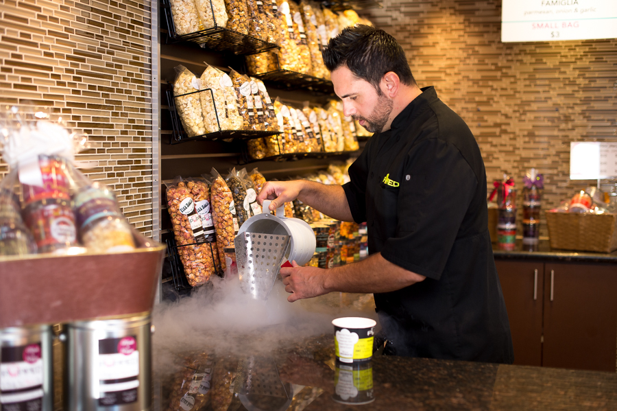 Popcorn lovers and Baby's Bounty supporters are encouraged to pop into POPPED's west side location on National Popcorn Day .