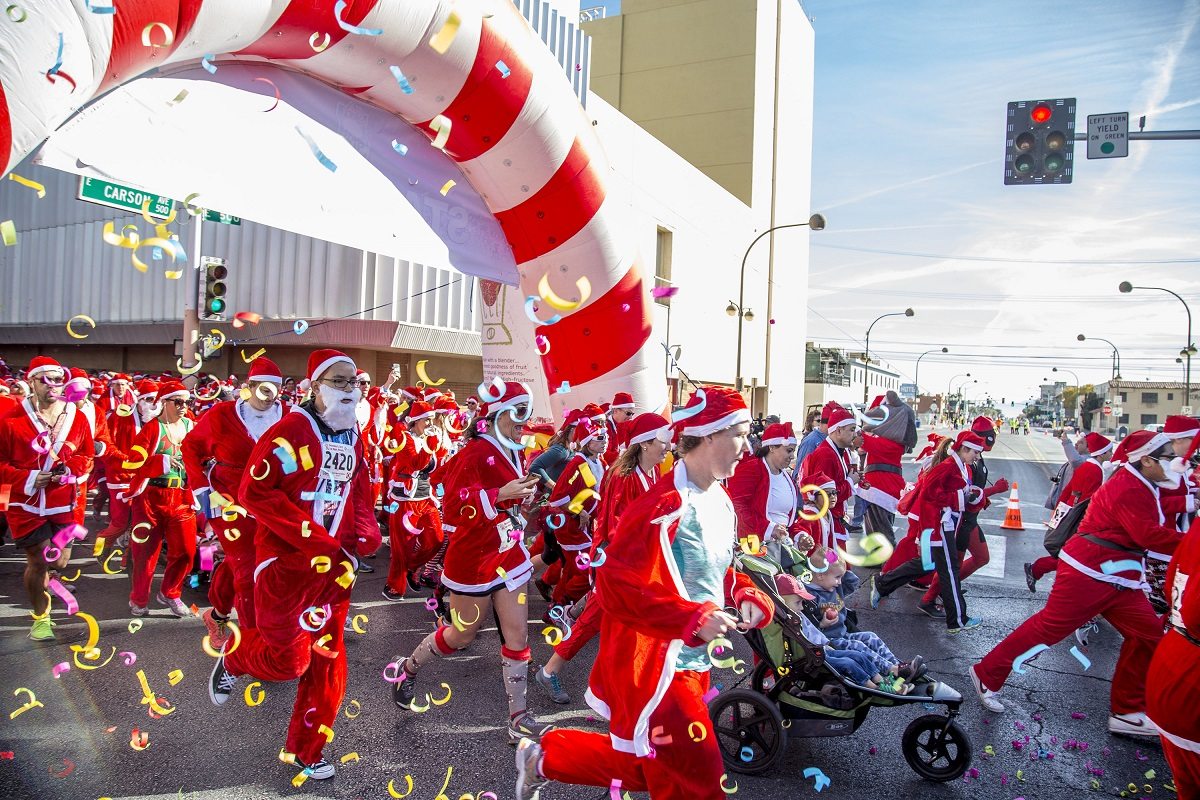 Santas will take over Downtown Las Vegas for the 12th annual, iconic Las Vegas Great Santa Run benefitting Opportunity Village on Saturday, December 3.