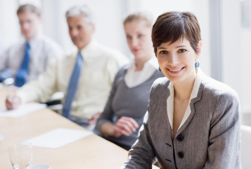 Office professionals sitting along a table in a conference room. Click to learn more about First Independent Bank's experienced banking counsel for your practice.