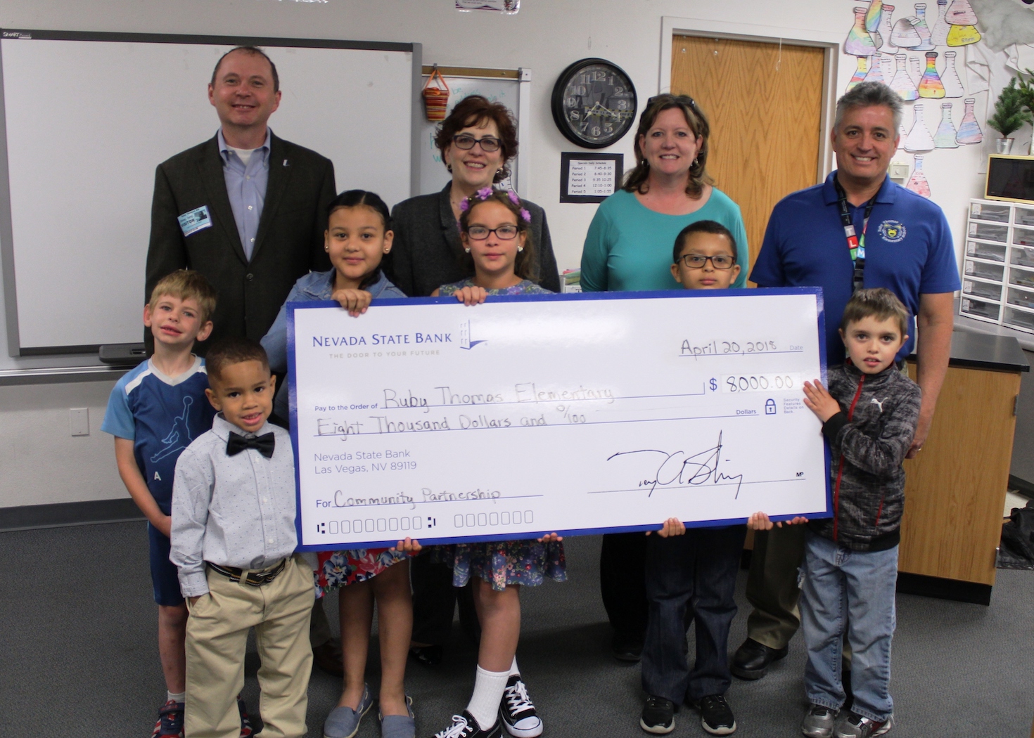 Nevada State Bank presented a check for $8,000 to Ruby Thomas Elementary School in celebration of Teach Children to Save (TCTS) and to support the school’s education efforts.