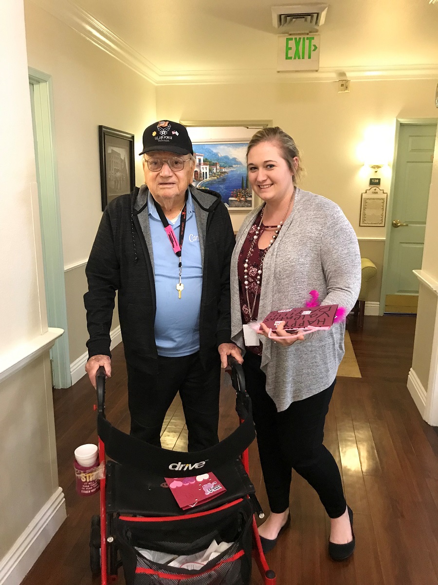CAMCO employee, Brittany Fuson, pictured with Heritage Springs resident.