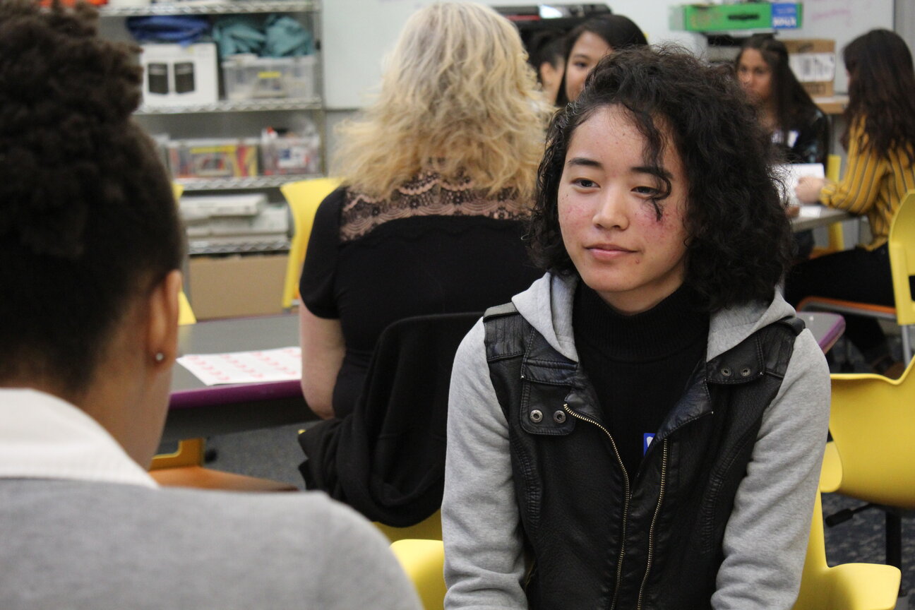 A student interacts with an executive in tech at a previous mentorship function