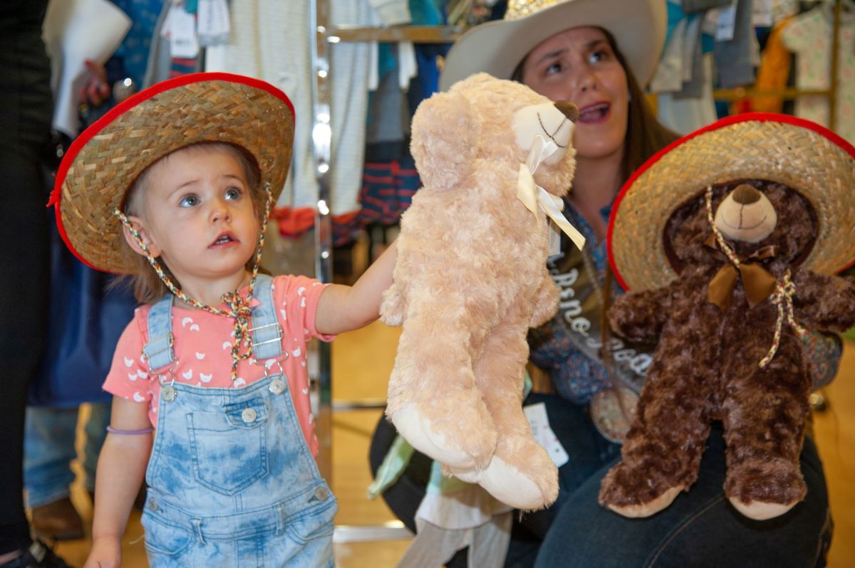 What a kind heart, as this youngster offers up her Teddy Bear-241d3c54