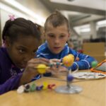 Youth working on a STEM Project sm