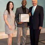 Michael Crome accepts Gold Leadership Award